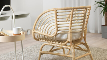 Contemporary rattan chair in a stylish living room with a cozy atmosphere.