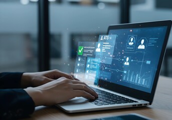 Obraz premium Person Uses Laptop for Application Tracking System
