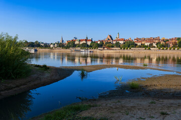 City Of Warsaw From Vistula River In Poland