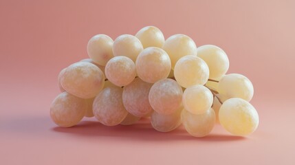 One white grape on a soft coral background, light and juicy.