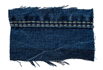 Piece of torn denim on a white background. Denim texture
