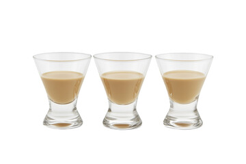 Three Glasses of Irish Cream Liqueur on Transparent Background.