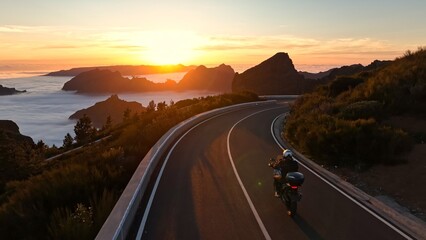 Motorcycle Rider Driving in High Mountain Landscape, Madeira Island , Portugal.