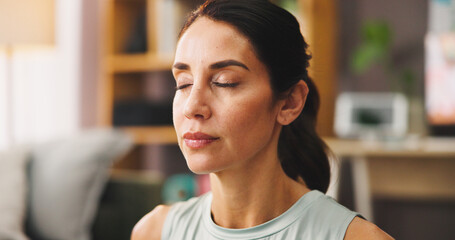 Calm woman, meditation and relax with zen for mindfulness or spiritual wellness at home. Female person, yogi or eyes closed with inner peace or breathing exercise for stress relief or awareness