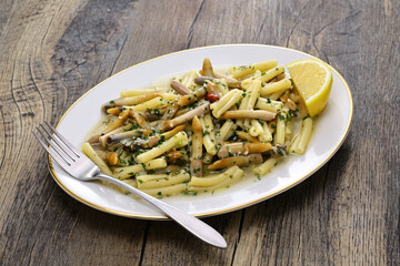 Caserecce pasta with razor clams