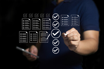 DSC_0676.3 a man answers and fills out a survey questionnaire online form, an online assessment and...
