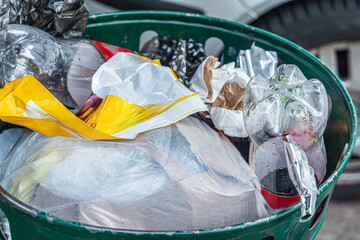 Garbage bin filled with garbage in the restaurant's kitchen