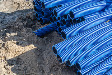 blue corrugated plastic plumbing pipe