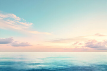 Obraz premium Calm ocean water reflects a pastel sky with soft clouds at sunrise or sunset.