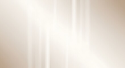 A dreamy, abstract image featuring soft, blurred streaks of light in warm neutral tones, creating an ethereal and gentle atmosphere.