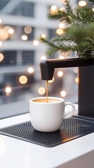 Festive coffee pouring into a mug near a window with bokeh lights