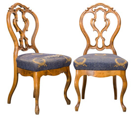Two vintage wooden chairs feature ornate backrests and blue padded seats, perfect for adding charm...