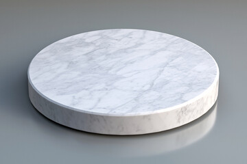 A clean circular marble pedestal sits on a neutral gray surface for product presentation display.