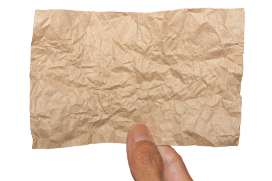 Man Hand Holding Torn Brown Crumpled Paper Texture Pieces on Transparent Background. Ideal for Text Space or Creative Project.