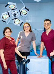 Surgical healthcare pros. Three healthcare professionals pose confidently in a bright surgical...