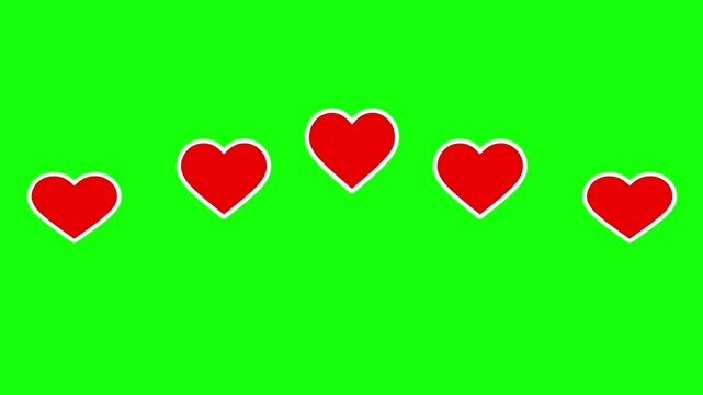 Looping animation of red hearts bouncing on green background