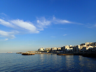 Fototapeta premium Alger the capital city of Algeria, North Africa, city centre of Algiers, the capital of Algeria, Landscape of Algiers city With port and mediterranean sea and white buildings, Arab Maghreb Africa.