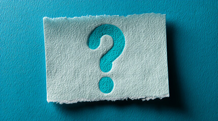 Torn light-grey paper on teal background, featuring a turquoise question mark Symbol of inquiry, uncertainty, or a need for information