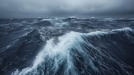 Turbulent Ocean Waves Under a Dark Grey Sky
