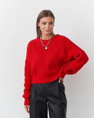 Confidence and style radiate from the young model in the vibrant studio setting