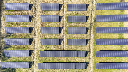Aerial drone view of solar panels farm, solar power for green sustainable renewable energy concept, photovoltaic power station or solar park in the Netherlands