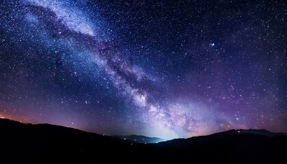 dark night sky with sparkling stars and nebulae