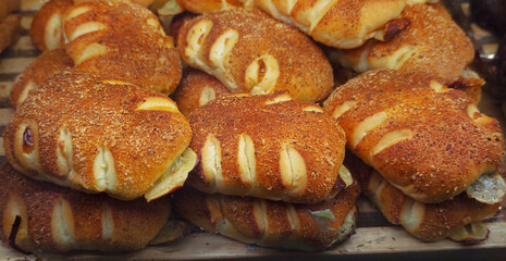 Fresh whole wheat bread on an attractive wooden board.