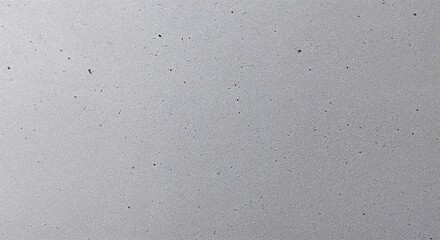 Close-up view of a textured light gray surface.