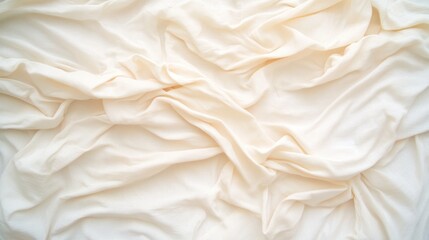 Obraz premium Creamy Soft Fabric Texture: A Luxurious Close-Up of Wrinkled, Draped Sheets