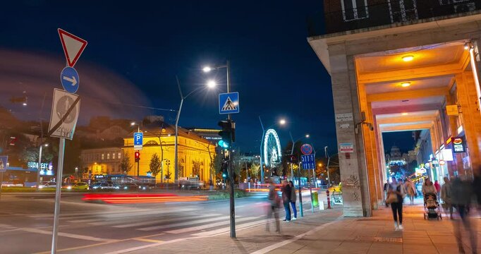 Budapest, Hungary - October 14, 2024: Evening Glow on K&aacute;roly Boulevard: Budapest's Historic Circle Comes Alive at Dusk. Timelapse, zoom out transition.