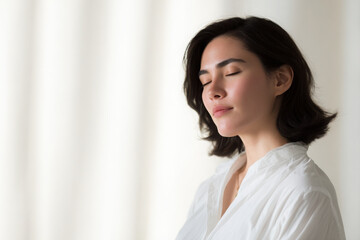 serene individual radiating calmness and confidence set against bright softlit background