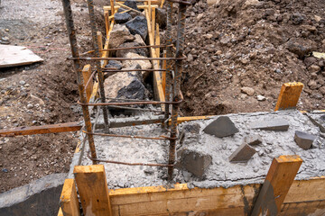 Pouring rubble concrete into the foundation
