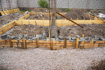 Pouring rubble concrete into the foundation