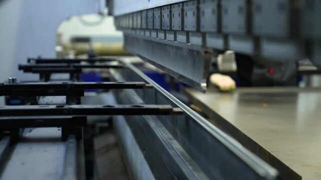 Press Machine Bends Perforated Metal Profile. 