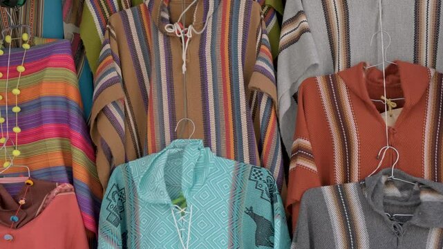 colorful handmade ponchos of the andean culture in la paz bolivia, south america - concept of handicraft