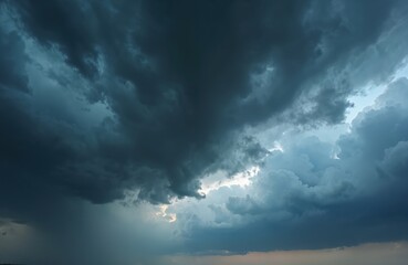 Fototapeta premium Dark clouds make sky. Heavy rain thunderstorm. Pattern clouds overcast predict tornado Hurricane. Dark sky cloudy have storm. Lightning. Weather forecast danger.