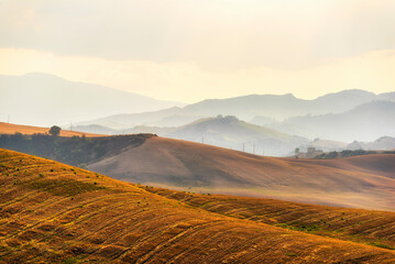 Obraz premium summer sunset over the Val d'Agri hills, Basilicata