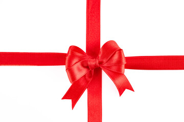 Red ribbon and bow on white background