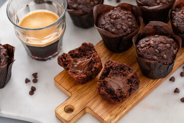 Chocolate chip muffins with chocolate filling split in half