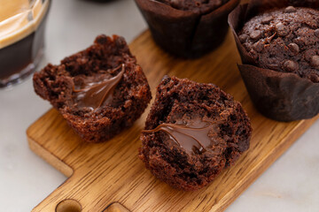 Chocolate chip muffins with chocolate filling split in half