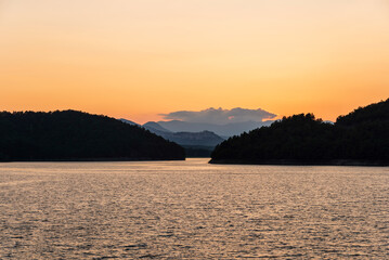 summer sunset over the lake Pertusillo, Val d'Agri, Basilicata, Italy