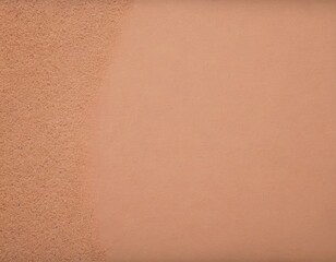 Close-up of soft, textured leather in warm peach tones, creating a sophisticated and inviting atmosphere.