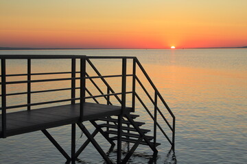 sunset on the pier, lake Balaton, Hungary