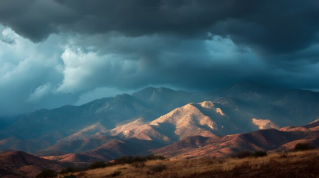 Dramatic, stormy sky over arid mountains
