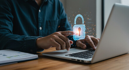 Man typing on laptop with digital padlock overlay representing online security and data protection concept business, data