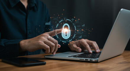 Man using laptop with digital padlock overlay representing cybersecurity and data protection online safety business, data