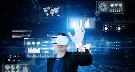 Smart business man with goggles working while using AI technology. Manager accessing at global network and using artificial intelligence while looking at data analysis and statistic chart. Ingenuity.
