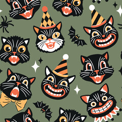 Obraz premium Seamless vector pattern with retro Halloween characters. Hand drawn spooky black cat and Halloween pumpkin illustration. EPS 10 vector file. Perfect for textile, wallpaper or nursery print design.