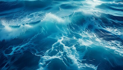 Obraz premium Pure blue turquoise water texture of the ocean sea with foam from and waves