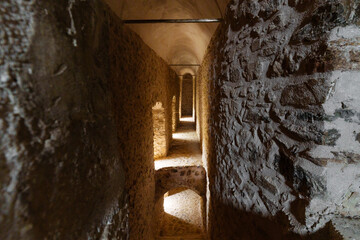 Historic castle Stone Corridor with Atmospheric Lighting..